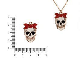 Dije Esmaltado Calavera con Moño base Dorada x 5 unidades